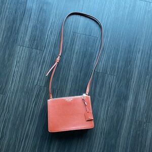 Beautiful brown mahogany leather Kate Spade purse. Lightly used.
